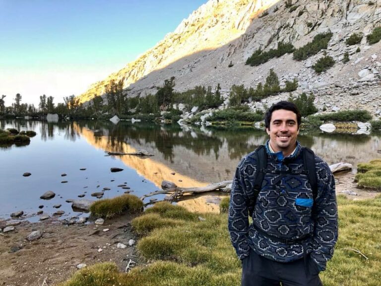 Augie Houlemard in front of a lake