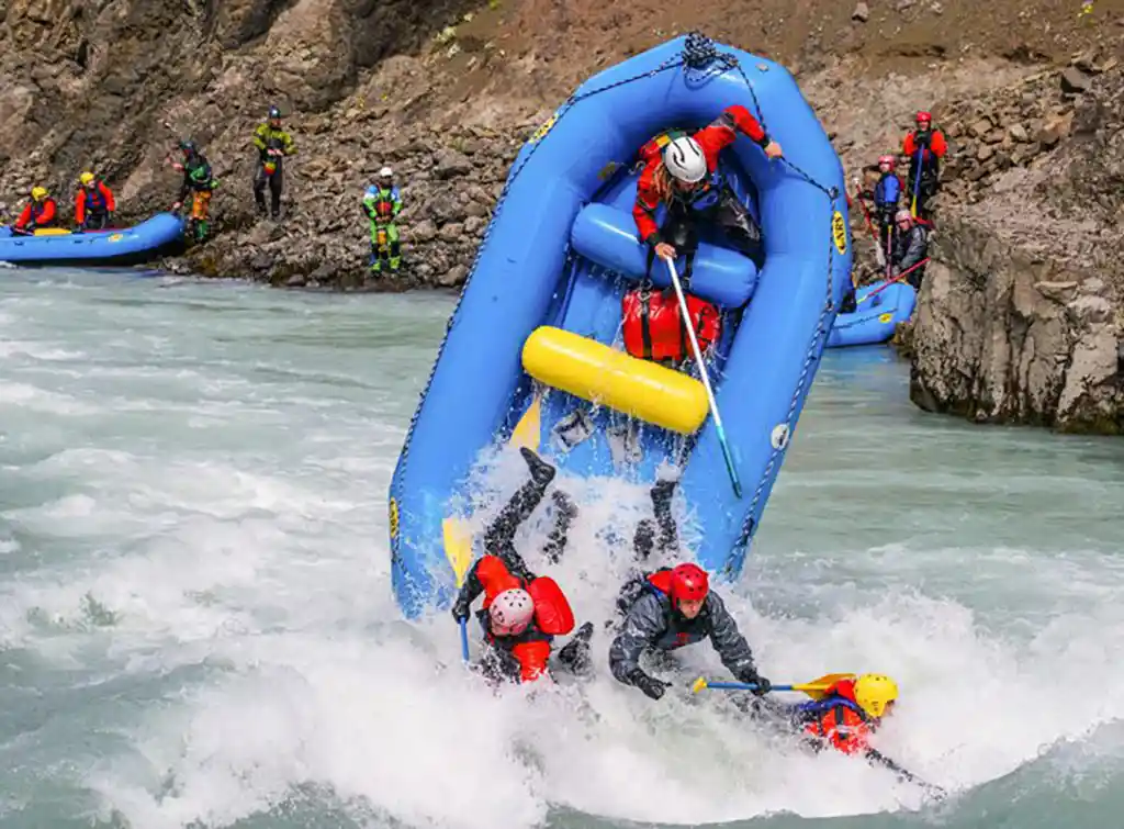 A raft getting endoed in a surf on the East Glacial River in Iceland